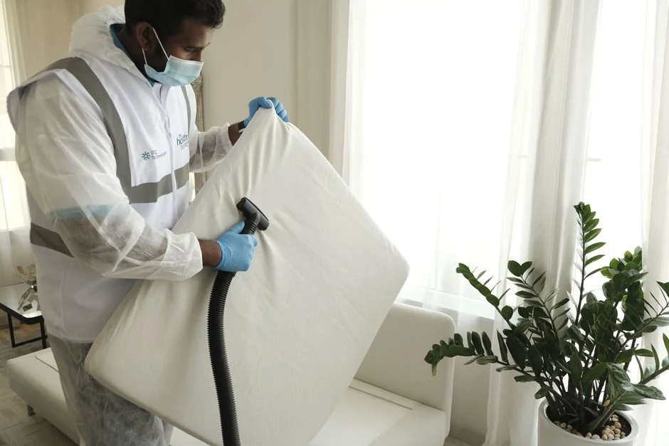 Cleaner cleaning the floor in a laboratory environment